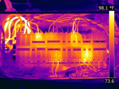Thermal camera image of a distribution board showing excessive heat building up at connections